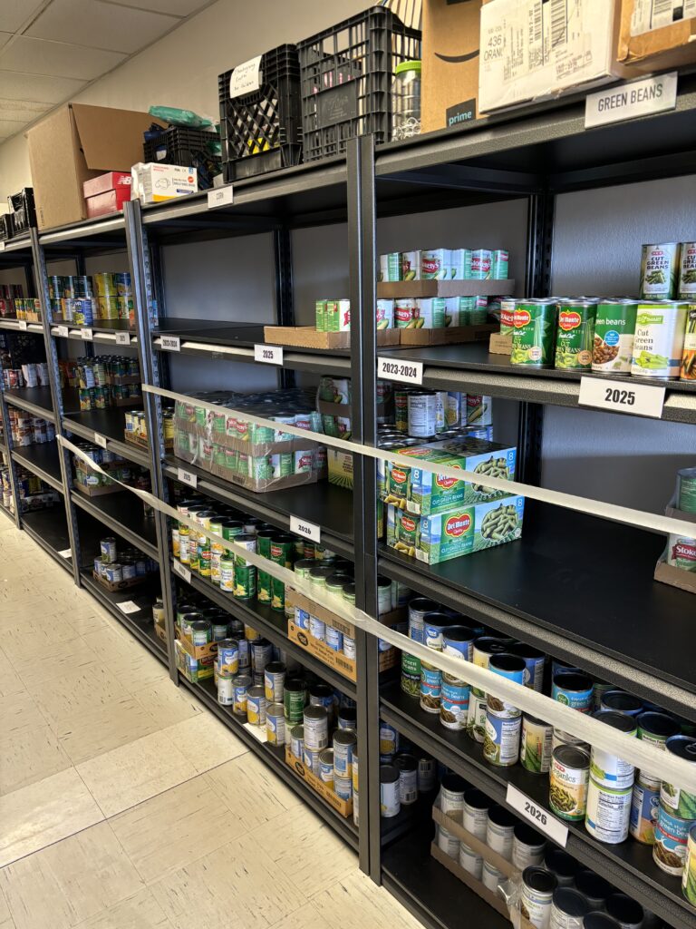 Shelves with canned goods